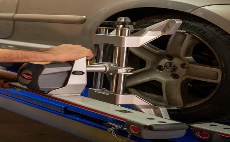 Wheel alignment equipment on a car